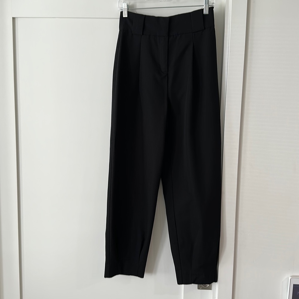 Dress pants tapered at the ankles